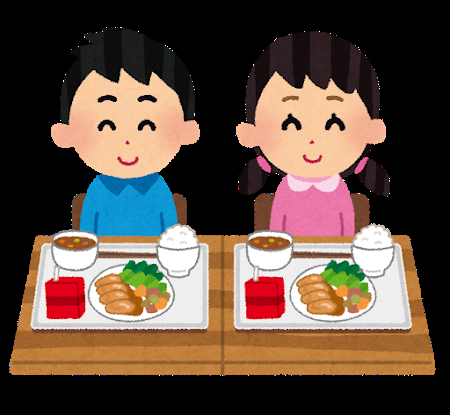 男の子と女の子が座っている机の上に給食が並んでいるイラスト